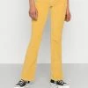 BDG Urban Outfitters FLARE - Trousers - Ceylon Yellow -BDG Urban Outfitters shop 136ce0586a7f4080a24716fd045455bd