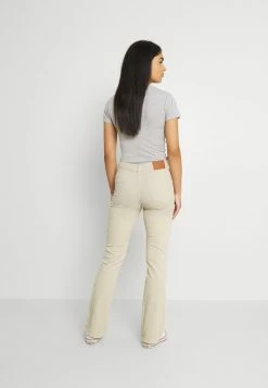 BDG Urban Outfitters FLARE - Trousers - Ecru -BDG Urban Outfitters shop 21c3fba368d141f5b64cf08016c511bd
