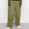 BDG Urban Outfitters CHUTE CARGO BAGGY TECH PANT - Trousers - Khaki -BDG Urban Outfitters shop 2739af3a8e384ac99440b731f58bcd5b
