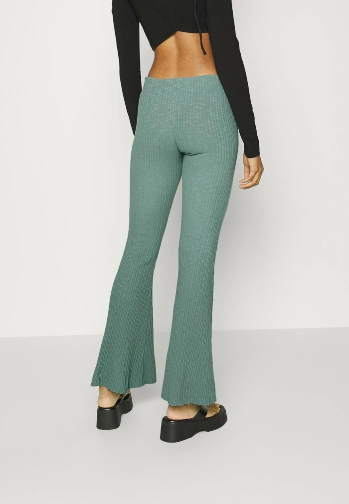 ROSIE FLARE - Trousers - turquoise BDG Urban Outfitters ROSIE FLARE - Trousers - Turquoise -BDG Urban Outfitters shop 2b5b3e5e50f74127a0d20b898b9ea3ac