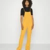 BDG Urban Outfitters EFFY SLEEVELESS DROP BACK - Dungarees - Orange -BDG Urban Outfitters shop 376544077bff4212b4fb005892ec859e