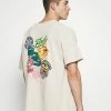 BDG Urban Outfitters BADGE TEE UNISEX - Print T-shirt - Cream -BDG Urban Outfitters shop 5cf649d7df8a45f0a8b69c8d127247b4