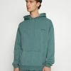 BDG Urban Outfitters SKATE HOODIE UNISEX - Sweatshirt - Teal -BDG Urban Outfitters shop 63ba676fa6ac4e9da0ba263225daa91f