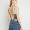 BDG Urban Outfitters STRAPPY BUNGEE BODY THONG STRAP - Top - Navy -BDG Urban Outfitters shop cf10aadd3e704bef980251fb2cdc08b5