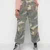 BDG Urban Outfitters CAMO BAGGY TECH PANT - Trousers - Green -BDG Urban Outfitters shop d8d473acc5f44d14a3a500b056e91a88